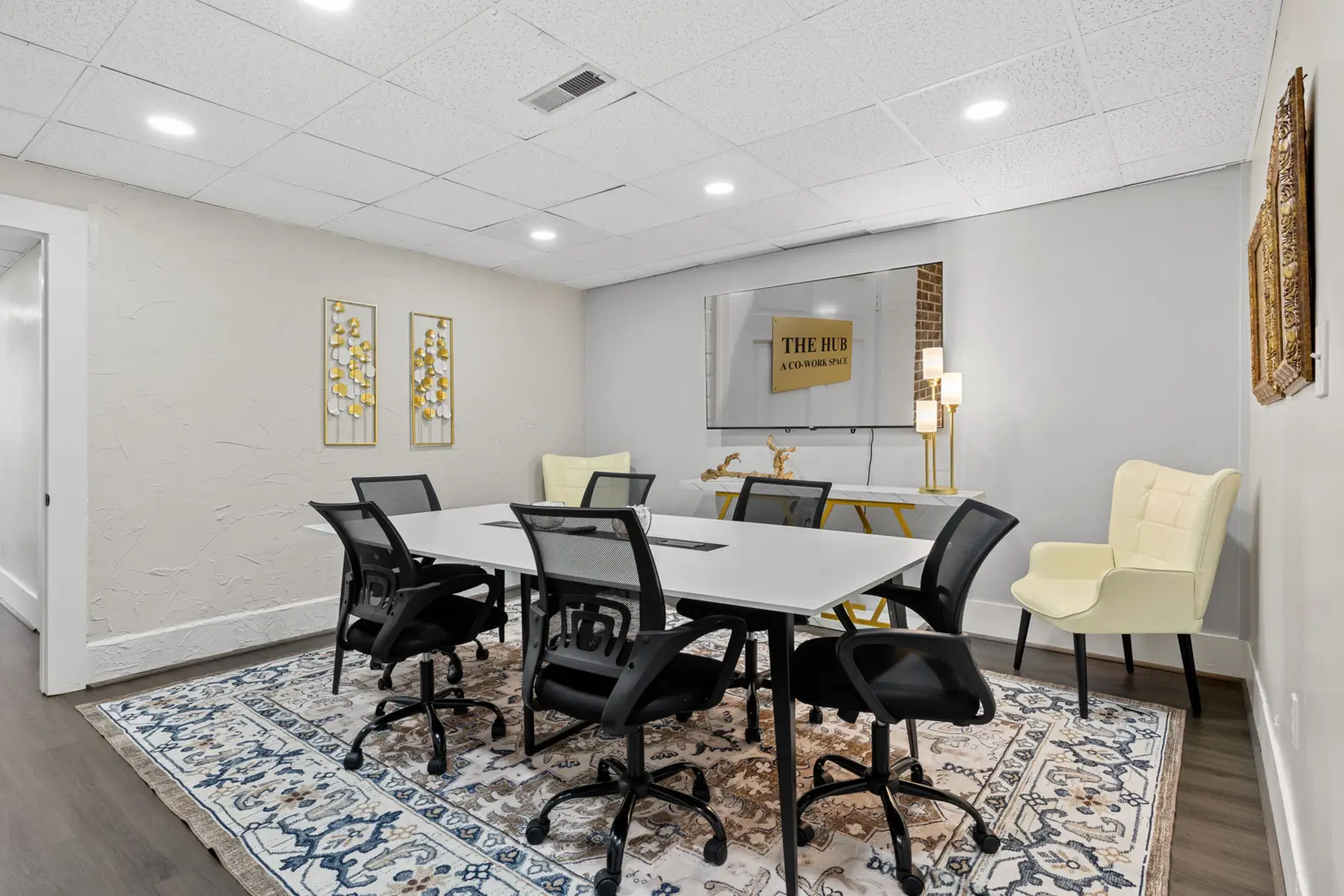 Conference room — 8-foot table, 70-inch screen