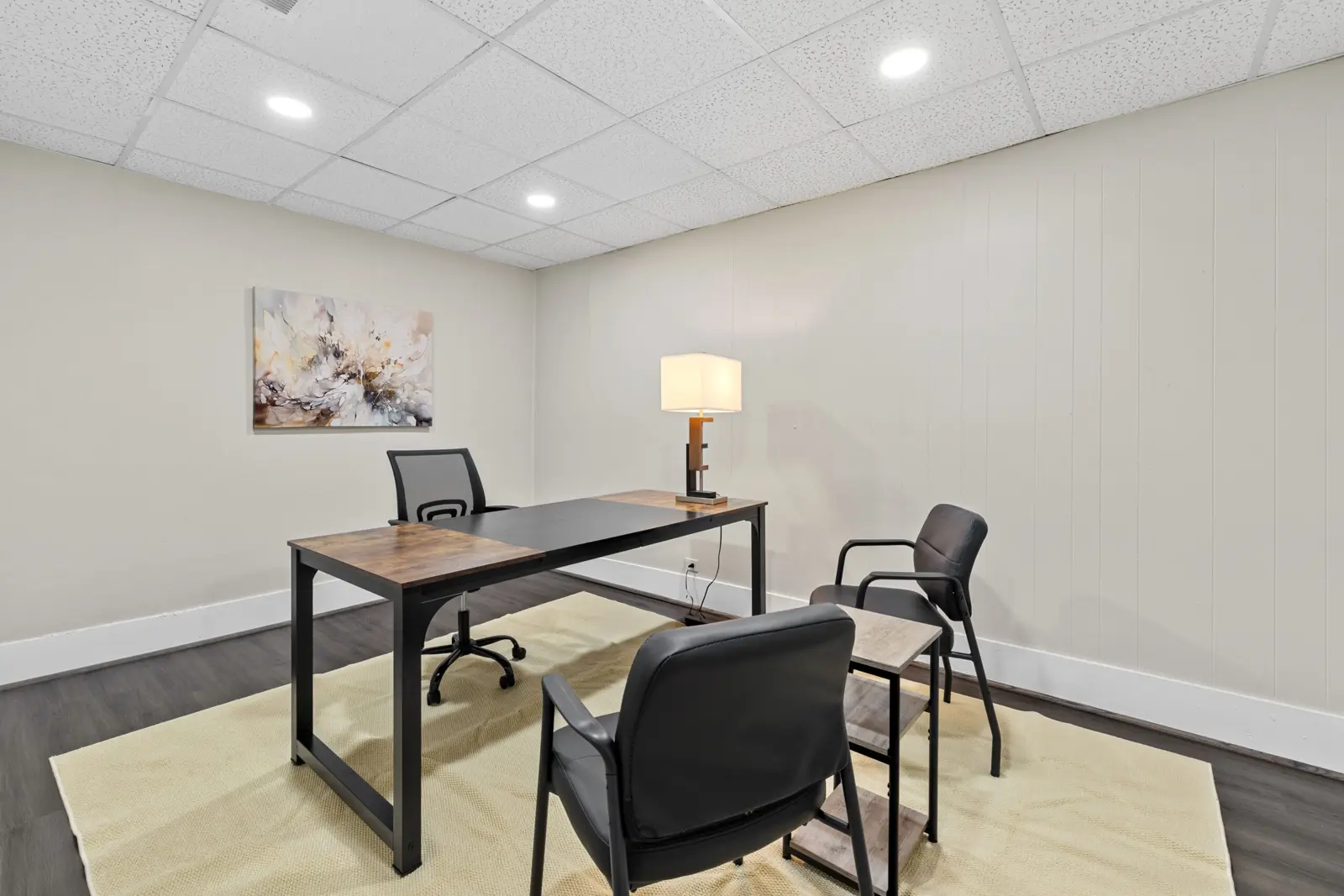 Furnished office with guest chairs